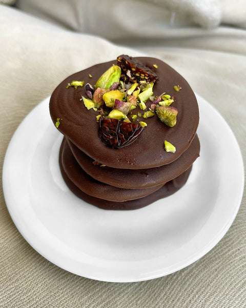 Chocolate Puddles with Dried Goldenberries and Pistachios